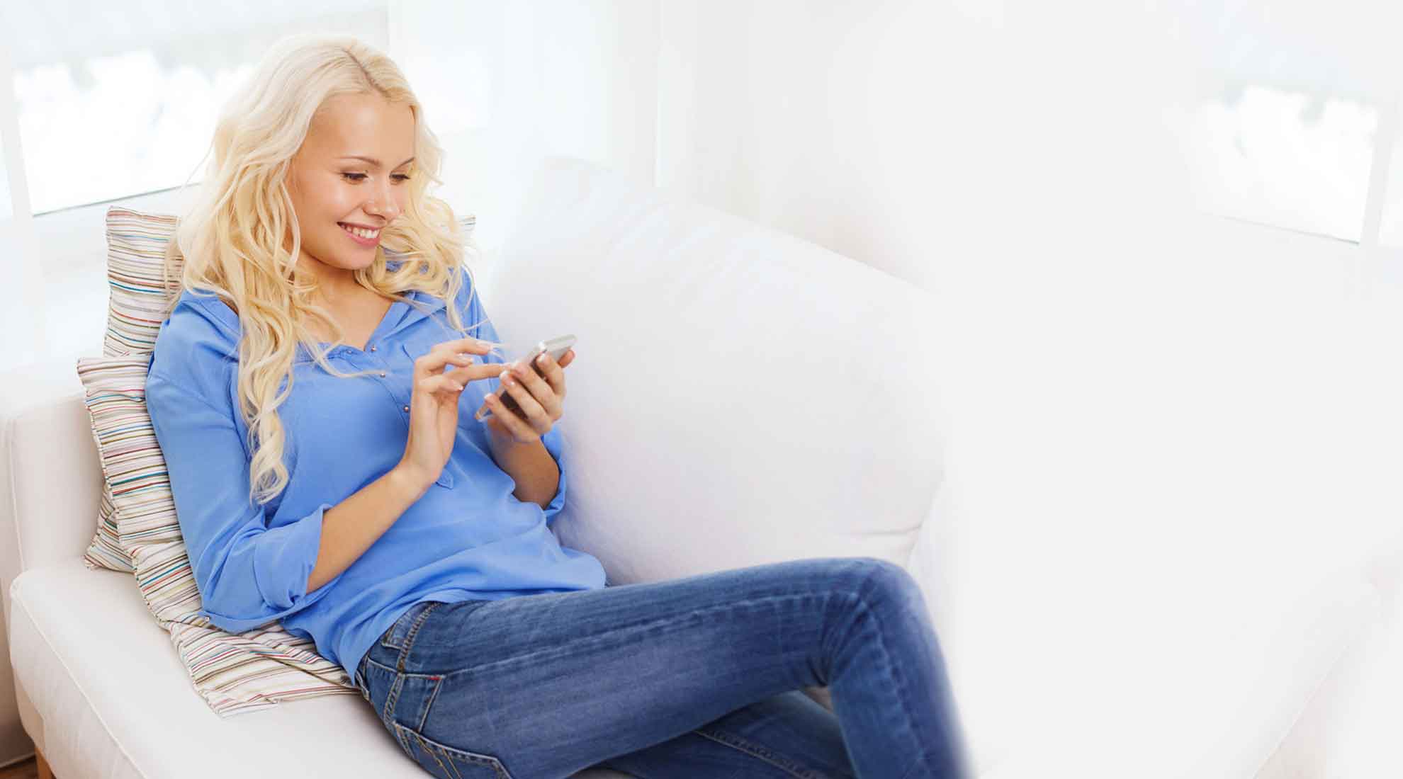 image of lady using a mobile website on a cell phone